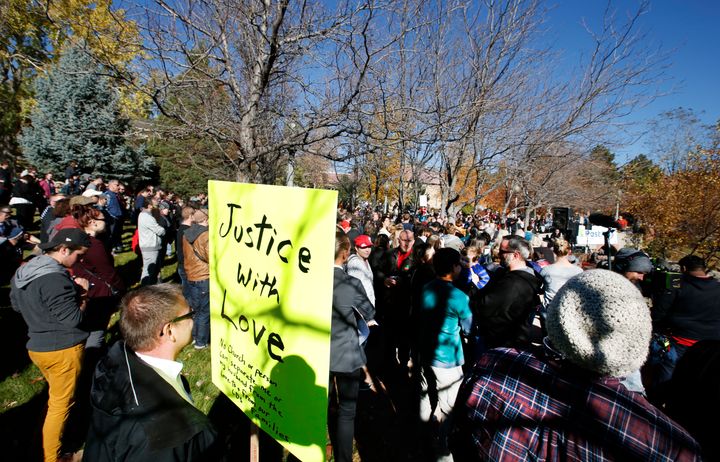 People protest in Salt Lake City, Utah, on Nov. 14, 2015, after the Church of Jesus Christ of Latter-day Saints announced it would consider people in same-sex marriages as apostates.