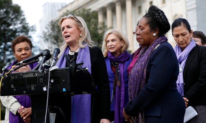 Rep. Debbie Dingell (D-Mich.) leads a news conference with Democratic congresswomen after the House passed legislation to reauthorize the Violence Against Women Act -- without much GOP help.