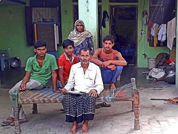Karam Rahman and family at their home in Haryana.