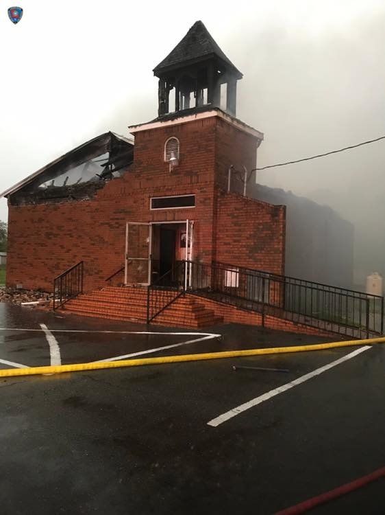 A photo from the Louisiana Office of State Fire Marshal shows the remains of a fire at Mount Pleasant Baptist Church in Opelo