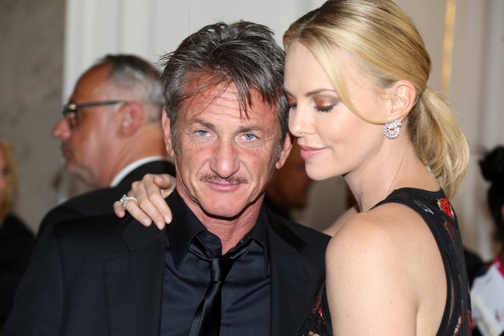 Sean Penn and Charlize Theron attend the AIDS Solidarity Gala together in 2015. 