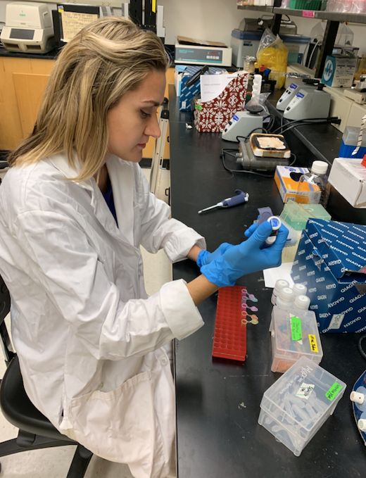 Ella in the microbiology lab where she works doing DNA extractions, March 2019.