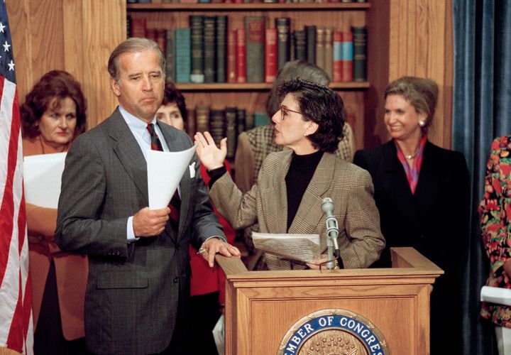 Sen. Barbara Boxer (D-Calif.), second from right, gestures toward Sen. Biden during a news conference on Capitol Hill to discuss the Violence Against Women Act, Feb. 24, 1993.