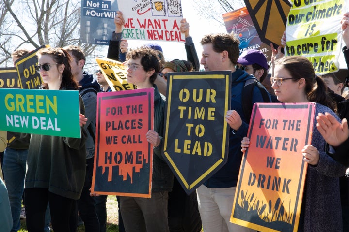 Sunrise Movement activists protest the Green New Deal.