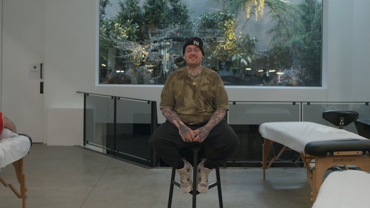 Keith "Bang Bang" McCurdy at the second location of Bang Bang Tattoo. The shop's ultramodern interior brings to mind an immac