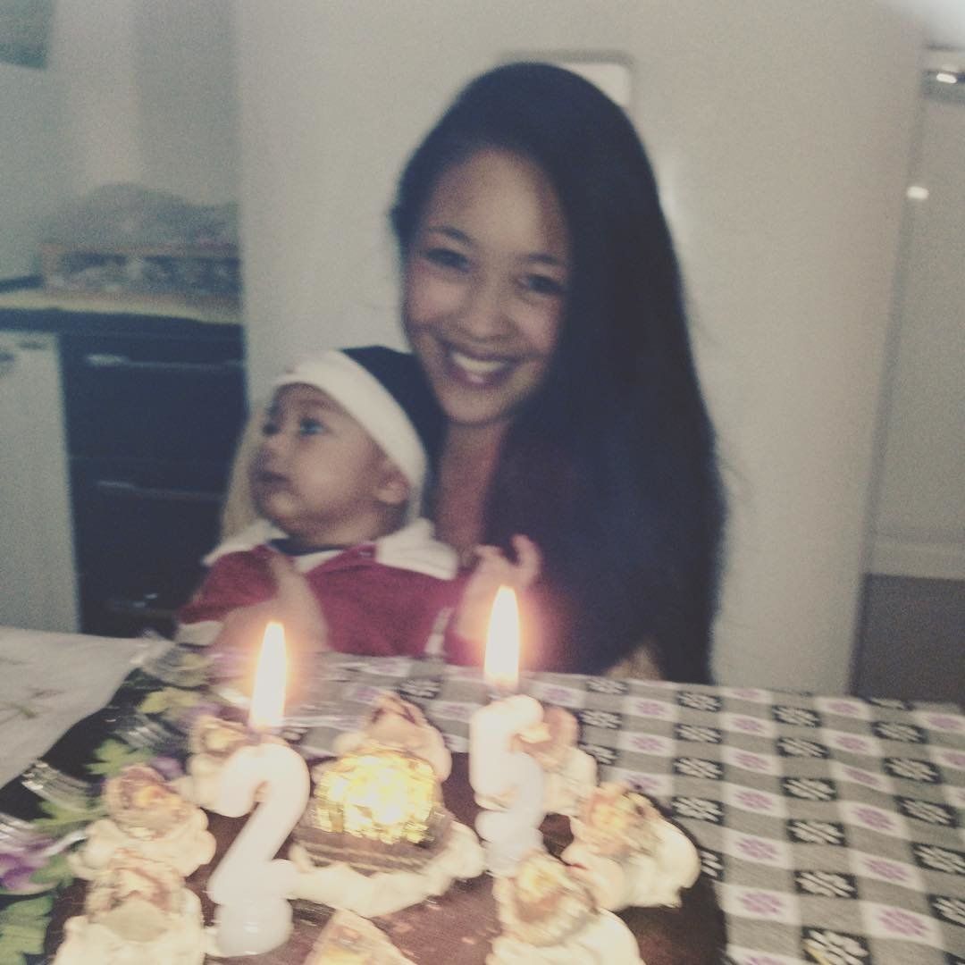 Kat and her son celebrate her 25th birthday in their home in São Paulo in 2016.
