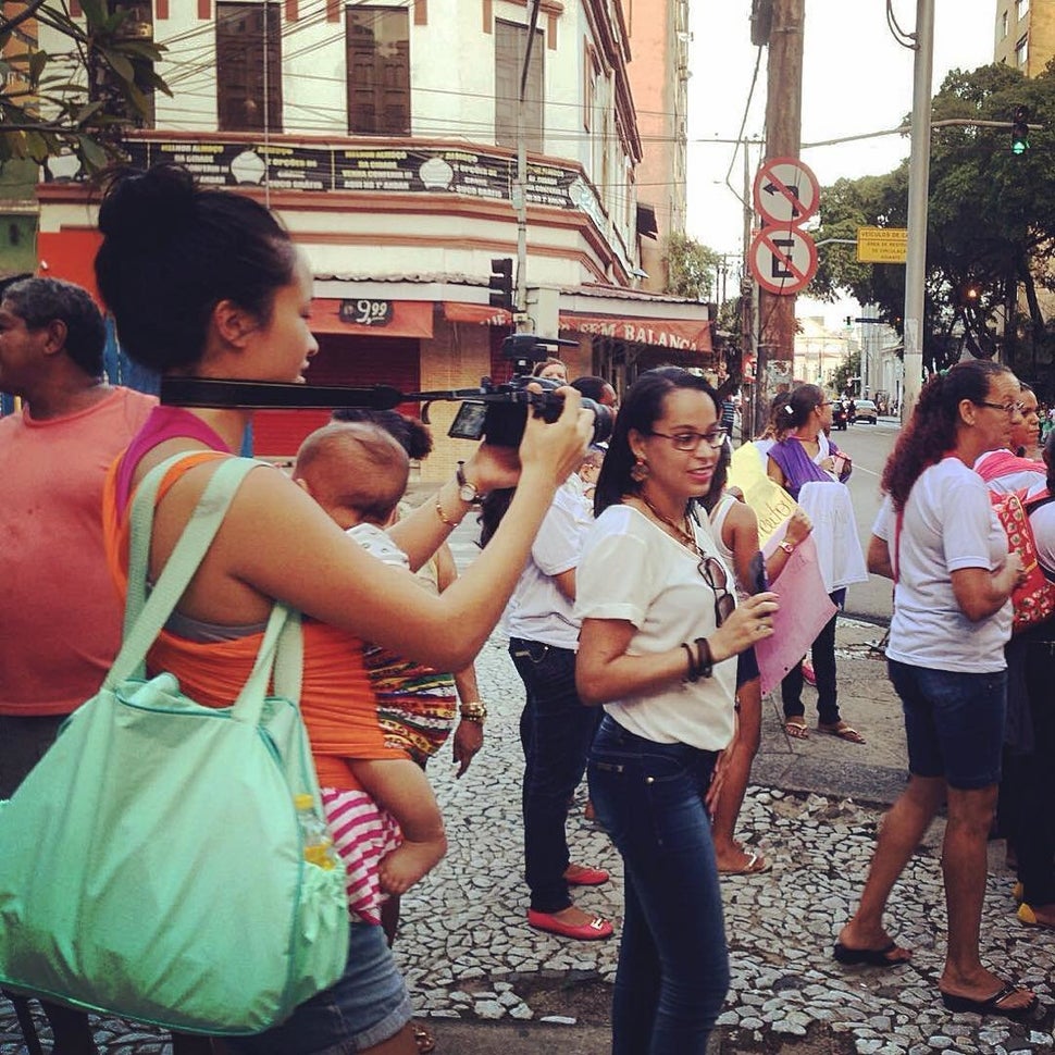 Kat and her son film a street demonstration of mothers diagnosed with the Zika virus and their babies born with microcephaly
