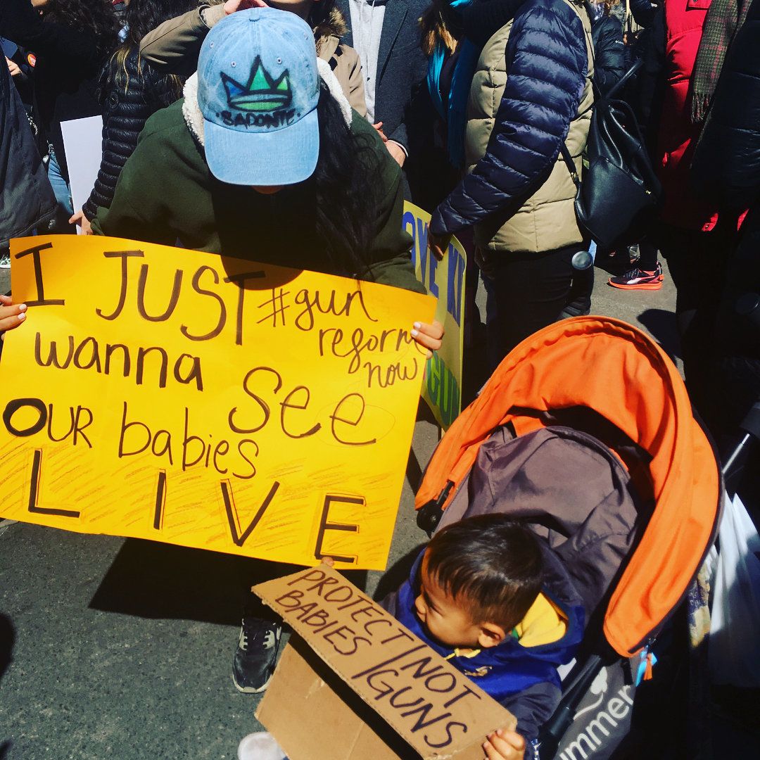 Kat and her son attend a march against gun violence in New York City in 2018.