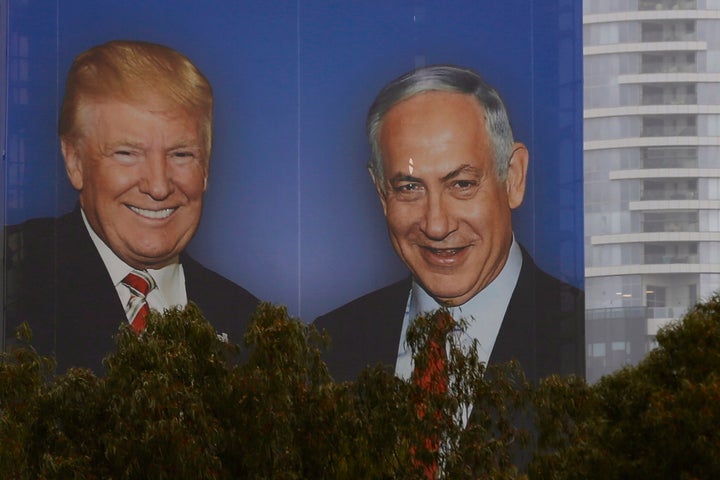 A billboard in Israel shows Donald Trump and Benjamin Netanyahu shaking hands. Netanyahu has used his friendship with Trump as proof of his influence.