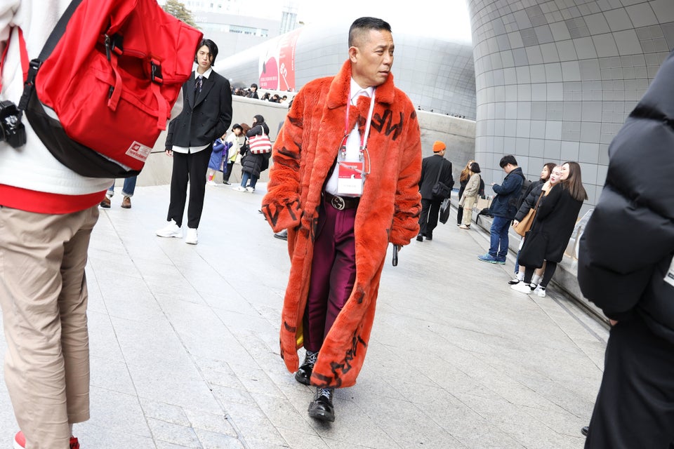 A guest wearing check jacket and pants with Gucci belt during News Photo  - Getty Images