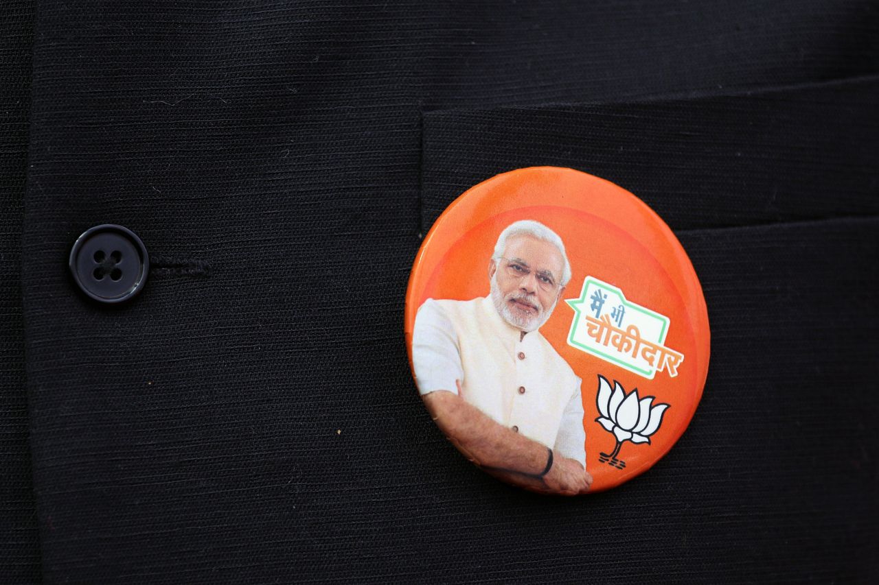 An image of Prime Minister Narendra Modi is displayed on a button during an event marking the release of the Bharatiya Janata Party manifesto in New Delhi on April 8, 2019.