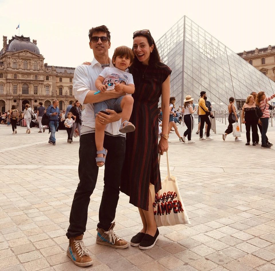 Arianna and Steve with their son, Theo, in Paris, spring 2018.