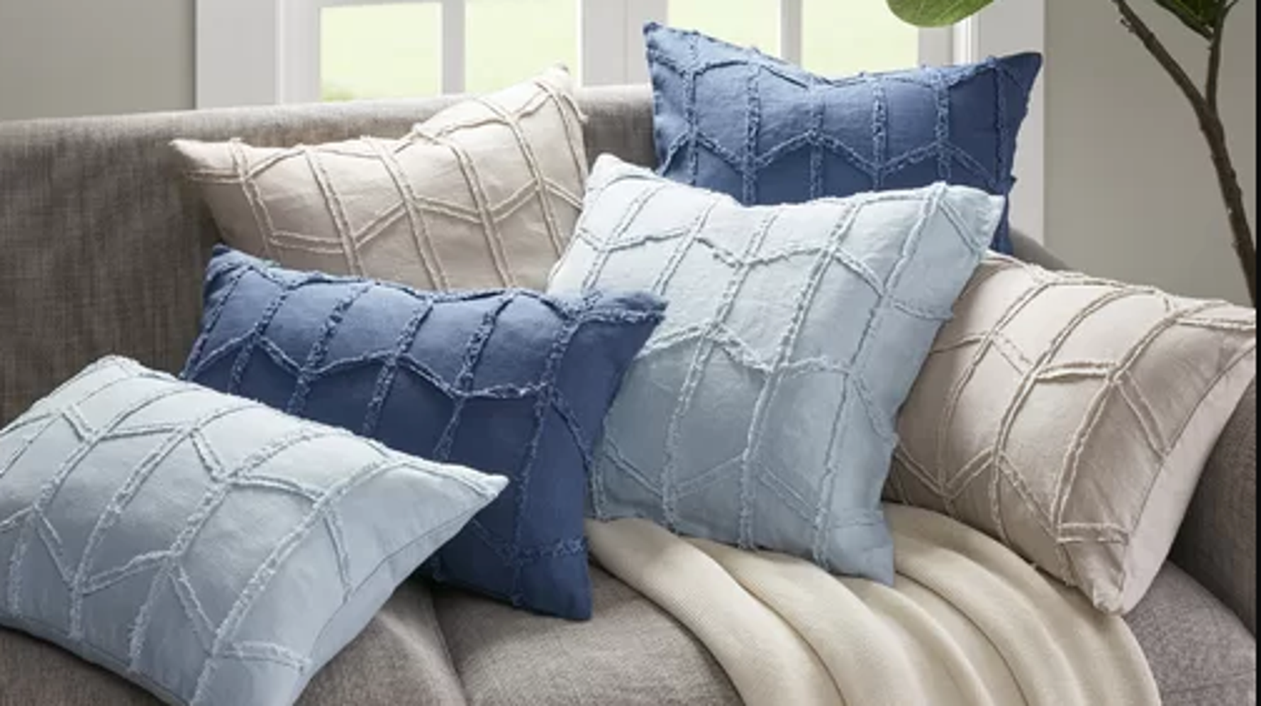 20 Throw Pillows Under 65 That ll Refresh Any Room Of Your Home