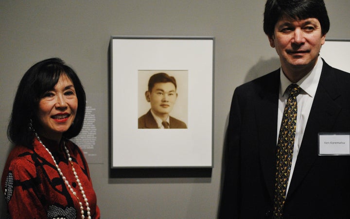 Karen and Ken Korematsu pose near photographs of their father, Fred Korematsu, during a presentation of his portrait to the National Portrait Gallery on Feb. 2, 2012. Korematsu challenged the incarceration of Japanese Americans during World War II.