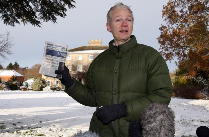 Assange addresses reporters outside Ellingham Hall in Norfolk