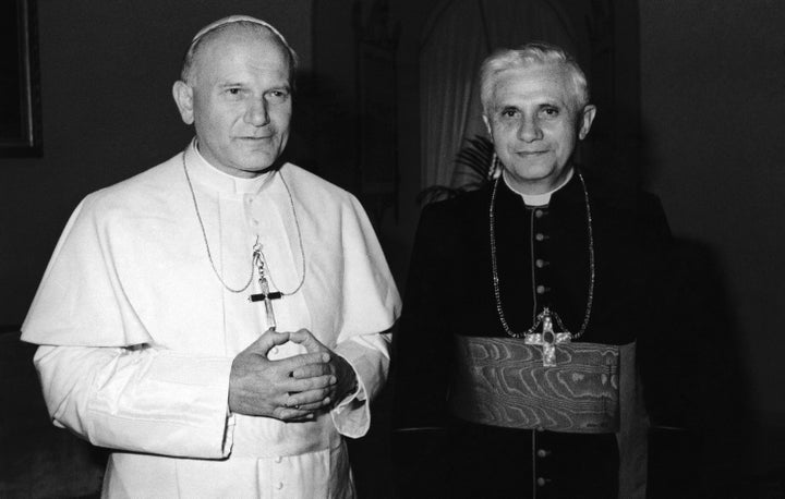 In this 1979 file photo, Pope John Paul II, left, poses with Cardinal Joseph Ratzinger of Munich, who would later go on to be pope. 