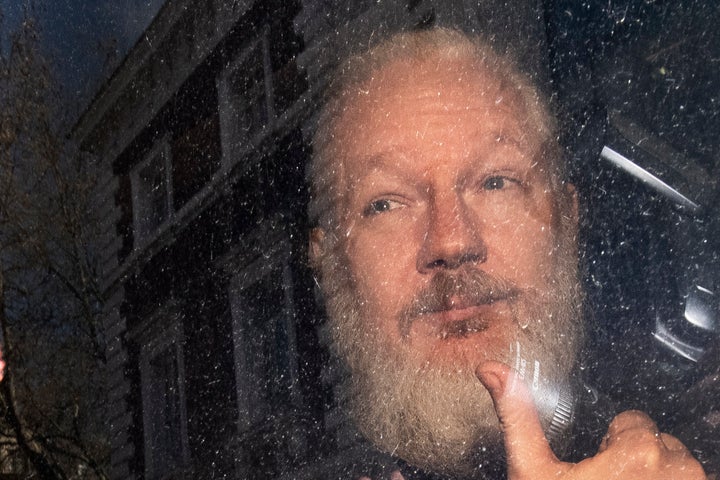 <strong>Julian Assange after he was arrested at the Ecuadorian embassy on Thursday </strong>