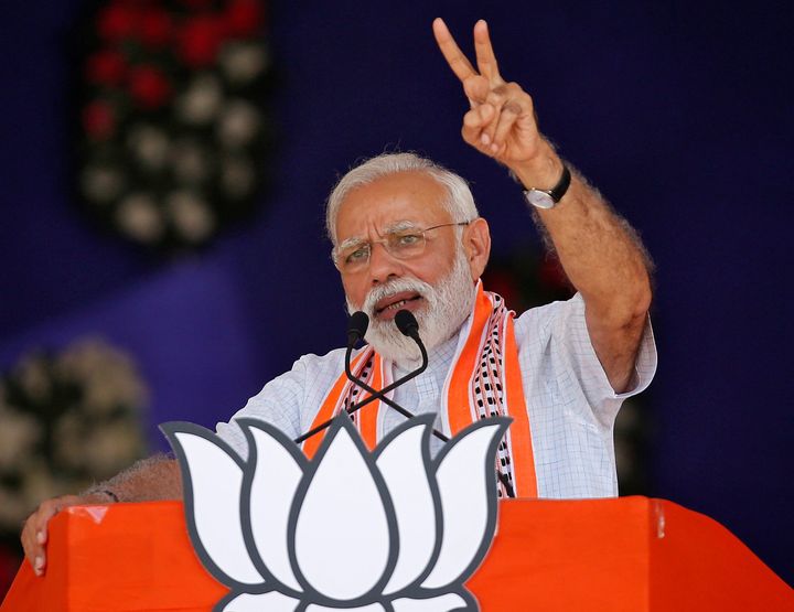 India's Prime Minister Narendra Modi addresses an election campaign rally in Junagadh, Gujarat, India