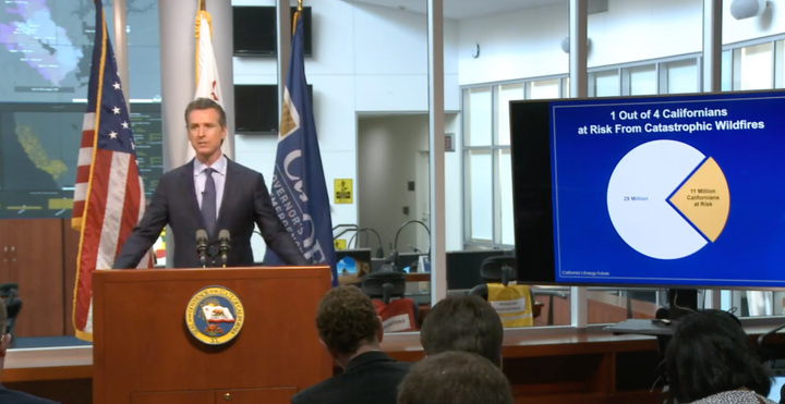 Calfornia Gov. Gavin Newsom speaking at <a href="https://www.caloes.ca.gov/cal-oes-divisions/news-media/cal-oes-live" role="link" class=" js-entry-link cet-external-link" data-vars-item-name="a press conference" data-vars-item-type="text" data-vars-unit-name="5cb0e185e4b098b9a2d38c95" data-vars-unit-type="buzz_body" data-vars-target-content-id="https://www.caloes.ca.gov/cal-oes-divisions/news-media/cal-oes-live" data-vars-target-content-type="url" data-vars-type="web_external_link" data-vars-subunit-name="article_body" data-vars-subunit-type="component" data-vars-position-in-subunit="7">a press conference</a> about the threat of wildfires in the state.