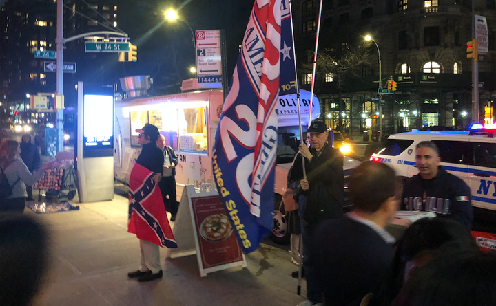 Pro-Trump protesters stand outside the Beacon Theatre ahead of “An Evening With the Clintons" on Thursday night.