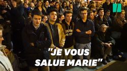 Face à Notre-Dame en flammes, des Parisiens chantent genoux à