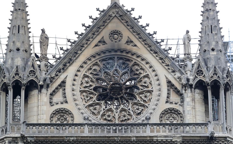 Smoke damage is seen at Notre Dame cathedral on Tuesday morning.