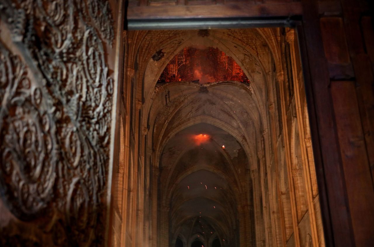 A spectacular image showed the ancient roof alight from within the cathedral.