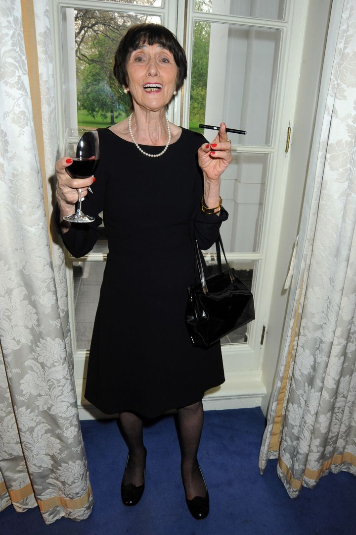 June in 2009, with a glass of red wine