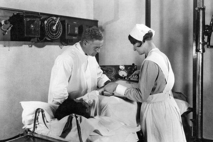 A doctor and nurse examine a patient's stomach in 1928 at John Harvey Kellogg's Battle Creek Sanitarium in Michigan, where Sojourner Truth and Henry Ford were those who went for intestinal spring cleanings.