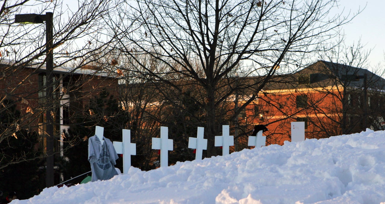 Crosses bearing the names of shooting victims placed on a hill overlooking the campus of Northern Illinois University in DeKalb, Illinois.