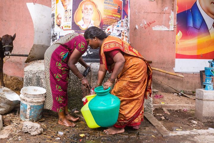 Kannika Arumugam collecting water from the local pump near her home in Chennai, India.