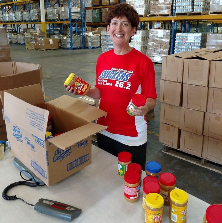 Boxing up peanut butters after a very successful food drive. Nut butters are a high-demand item, especially for kids, families and seniors.