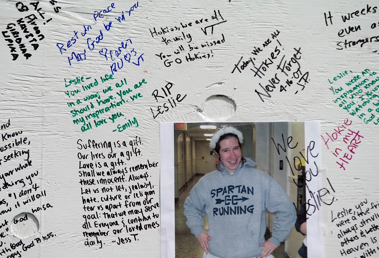 A photograph of one of the Virginia Tech students killed is shown among remembrances on a memorial on the campus in 2007.