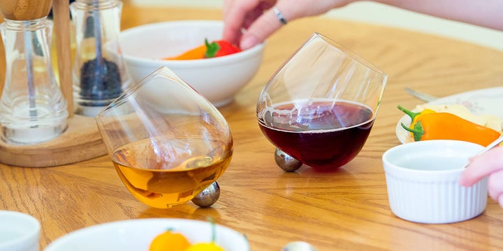 The red wine stain solution? An unspillable wine glass!