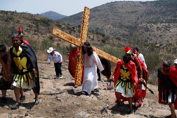 People reenact the crucifixion of Jesus on Good Friday on a hill outside the village of San Mateo, Tepotzotlán, Mexico, on April 19, 2019.