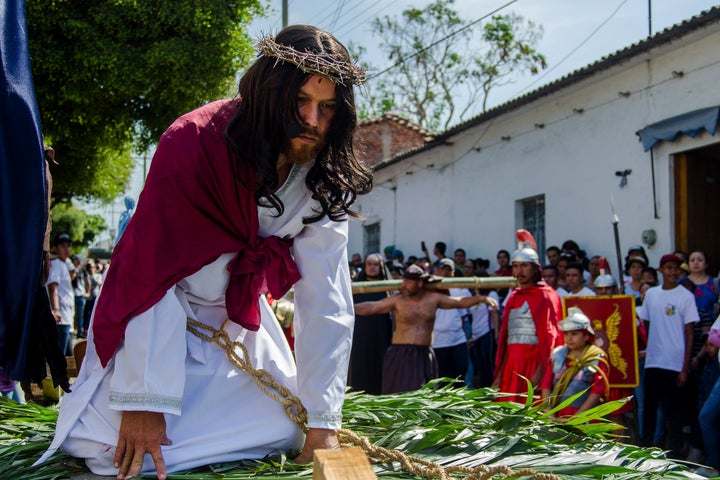 A Christian portraying Jesus recreates the Stations of the Cross during Good Friday on April 19, 2019, in Colima, Mexico.