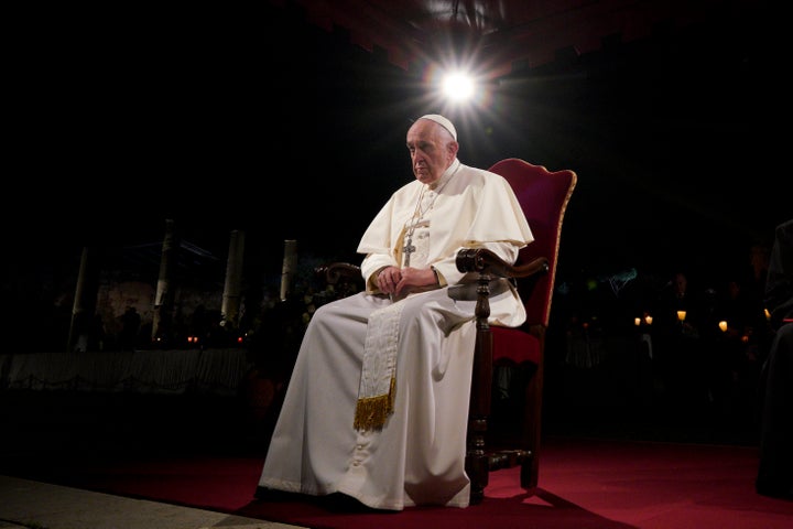 Pope Francis presides over the Via Crucis (Way of the Cross) torchlight procession on Good Friday in front of Rome's Colosseum on April 19, 2019.