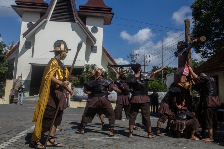 Christians reenact the crucifixion of Jesus in Surabaya, East Java.