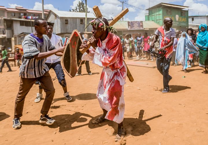 Christian devotees reenact the Way of the Cross, or Jesus Christ's passion, during a Good Friday commemoration in Kibera, Nairobi, on April 19, 2019.
