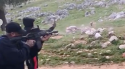 Booba tire à l’arme à feu sur un portrait de