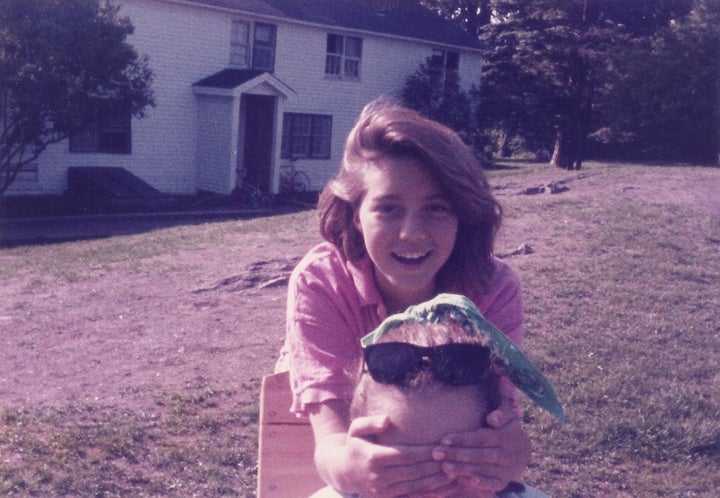 Allison Lirish Dean (top, smiling) as a young student, with a friend on the campus of the Putney School, spring 1985.