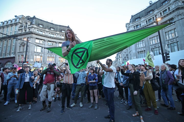 Protesters have descended on Waterloo Bridge in London as they demand urgent action to tackle climate change.