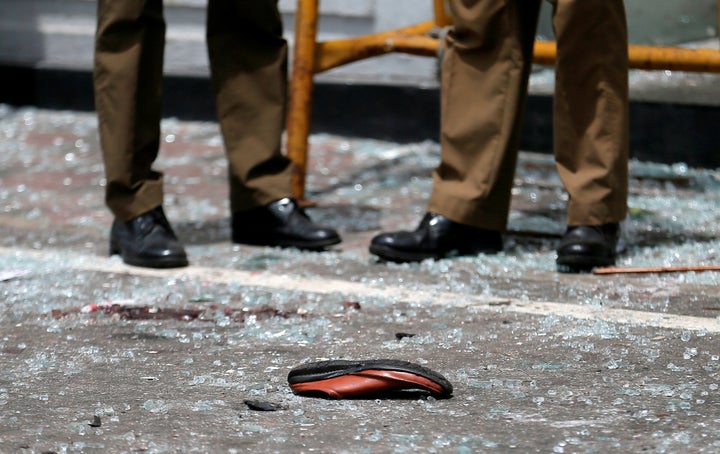 A shoe of a victim is seen in front of the St. Anthony's Shrine, Kochchikade church after an explosion in Colombo, Sri Lanka, April 21, 2019. (REUTERS/Dinuka Liyanawatte)