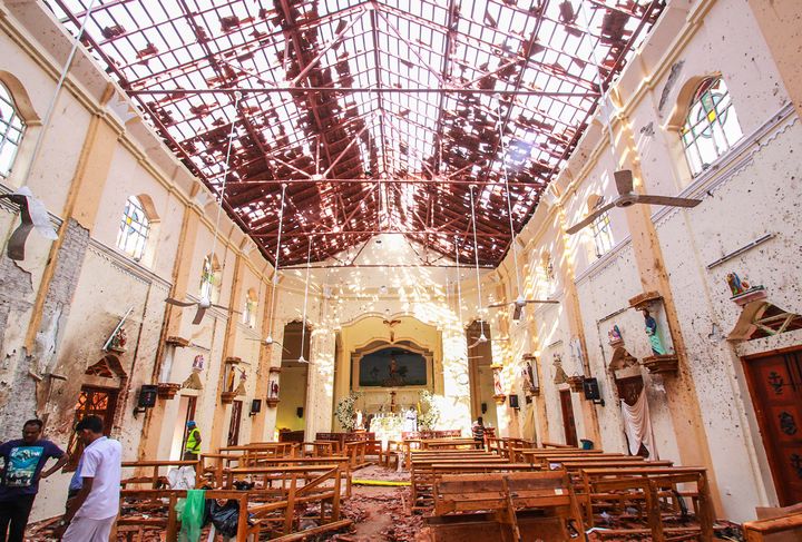 Sri Lankan officials inspect St. Sebastian's Church in Negombo, north of Colombo, after multiple explosions targeting churches and hotels across Sri Lanka.
