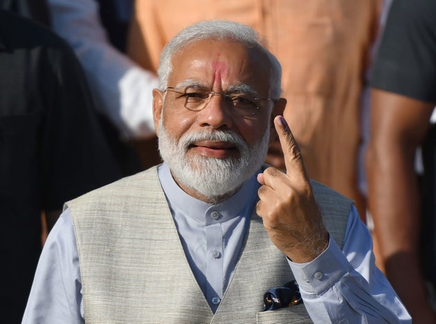 Elections Phase 3: Modi Casts Vote In Ahmedabad, Greets Voters Along The