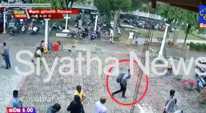 Local TV has released footage of a suspected bomber carrying a heavy backpack and walking on the street before heading into the St Sebastian’s Church on Easter Sunday