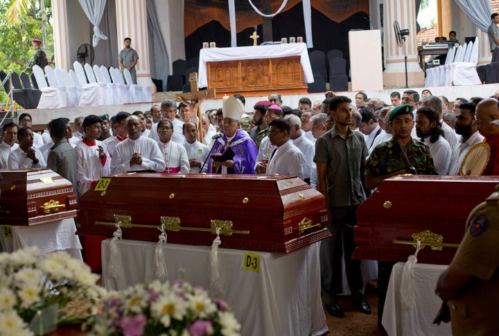Cardinal Malcolm Ranjith speaks during a funeral service for victims at St. Sebastian's Church in Negombo, Sri Lanka, on Apri