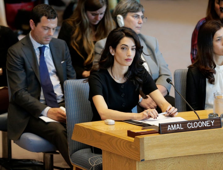 The council voted after hearing briefings from Nobel Peace Prize winners Nadia Murad, an Iraqi Yazidi woman who was held as a sex slave by Islamic State militants, Congolese doctor Denis Mukwege, who treats rape victims, Libyan rights activist Inas Miloud, and international human rights lawyer Amal Clooney (center).