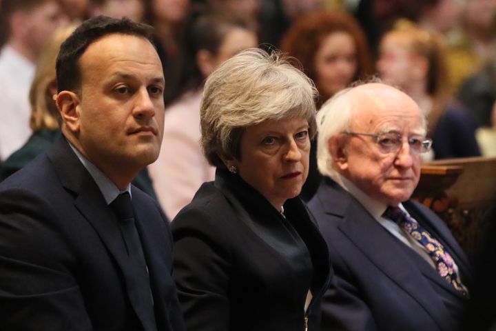 Taoiseach Leo Varadkar , Prime Mnister Theresa May and President Michael D Higgins before the funeral service.