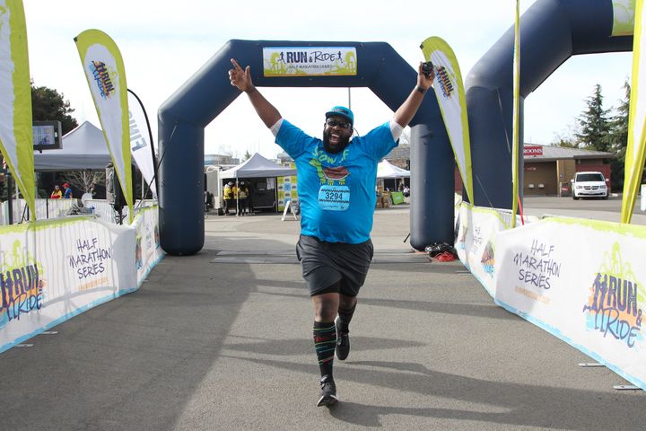 Evans crosses the finish line of the Snoopy Loopathon in December 2018.